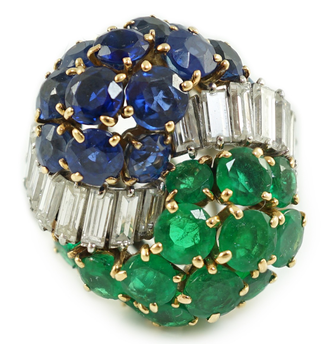 A mid 20th century French 18ct white gold round cut emerald, sapphire and graduated baguette cut diamond cluster set 'Yin-Yang' dress ring, by Mauboussin, Paris